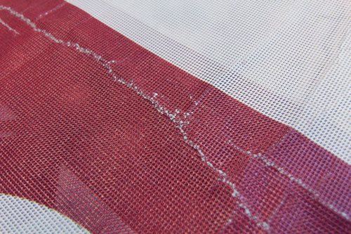 Mesh Banner nach langjährigem Einsatz